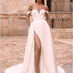 Robe de mariée blanche épaules dénudées avec fente élégante
